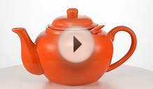 shopgrosche.com Dominion teapot 24 oz orange with infuser