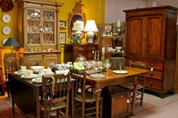 Antique showroom space: antique tables and tea set