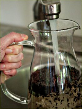 Step Two: Fill your container with 1 cup (8 oz) room temperature water per final cup iced tea.