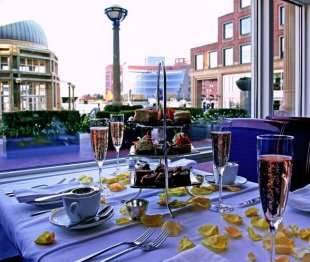 Take tea overlooking Boston Harbor at Rowes Wharf Sea Grille (©Boston Harbor Hotel)